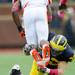 Michigan safety Jordan Kovacs tackles Illinois ball carrier running back Josh Ferguson the second quarter at Michigan Stadium on Saturday.  Melanie Maxwell I AnnArbor.com